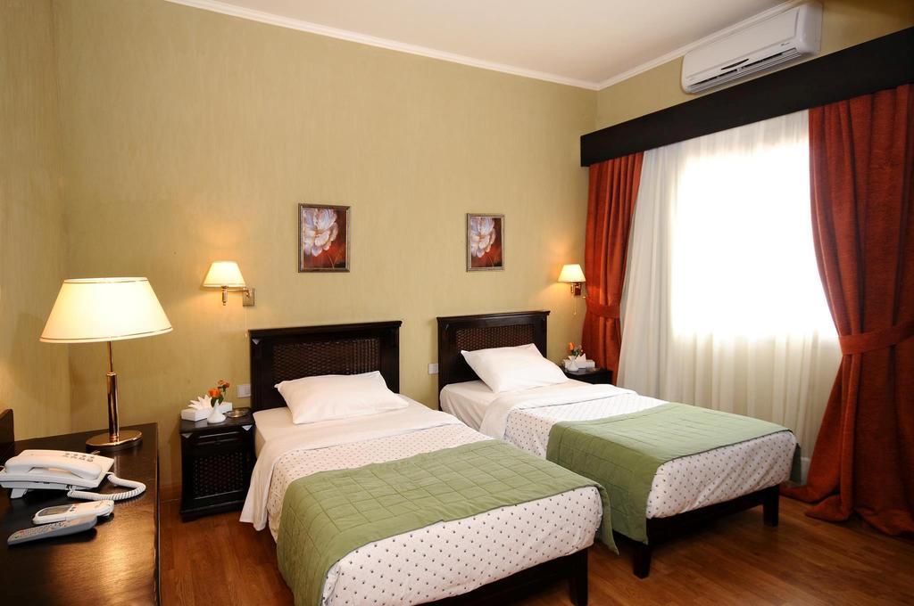Green Plaza Inn "'Business &Families Only"' Alexandria Ruang foto
